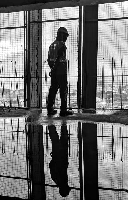 Construction worker representing the Alphadex team